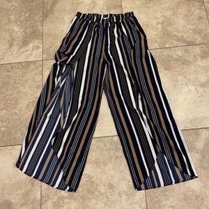 Navy blue, white and gold striped palazzo pants with leg slits
